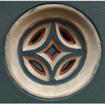 Carved and painted roundel in choir stalls